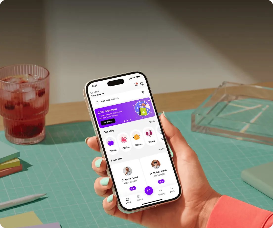 Hand holding a phone with a consumer app